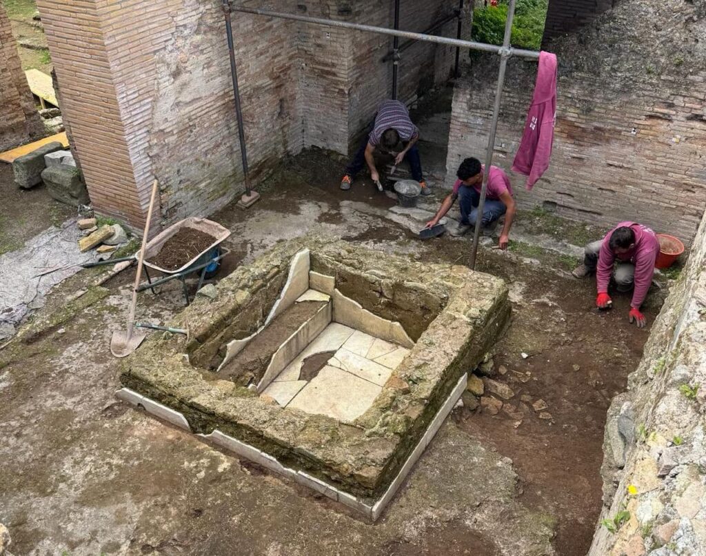 A view of the discovered "vasca" (pool), identified as an ancient baptistery, within the excavated Roman thermal baths. Credit: Archaeological Park of the Appia Antica.