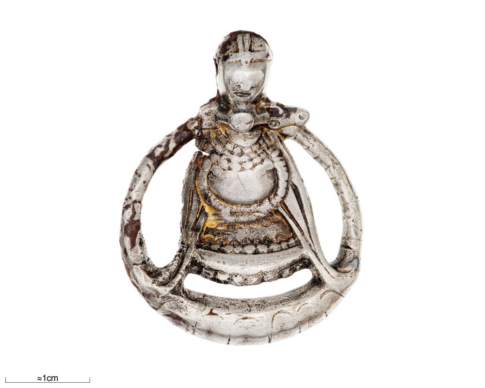 Pendant showing the only known Viking-Age depiction of a pregnant body. The artefact was found in a 10th century, Swedish burial for a woman, buried with a rich and varied artefacts assemblage as well as animals -- one interpretations is that she was a 'seeress'/ritual specialist. Credit: O. Myrin, The Swedish History Museum/SHM