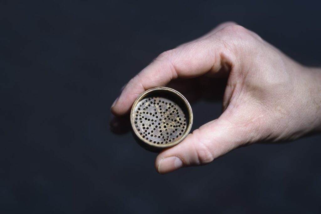 A sand spreader was one of the finds. It was used to sprinkle fine sand over written pages to absorb excess ink. Credit: Marcus Andersson for the Archaeologists, SHM.
