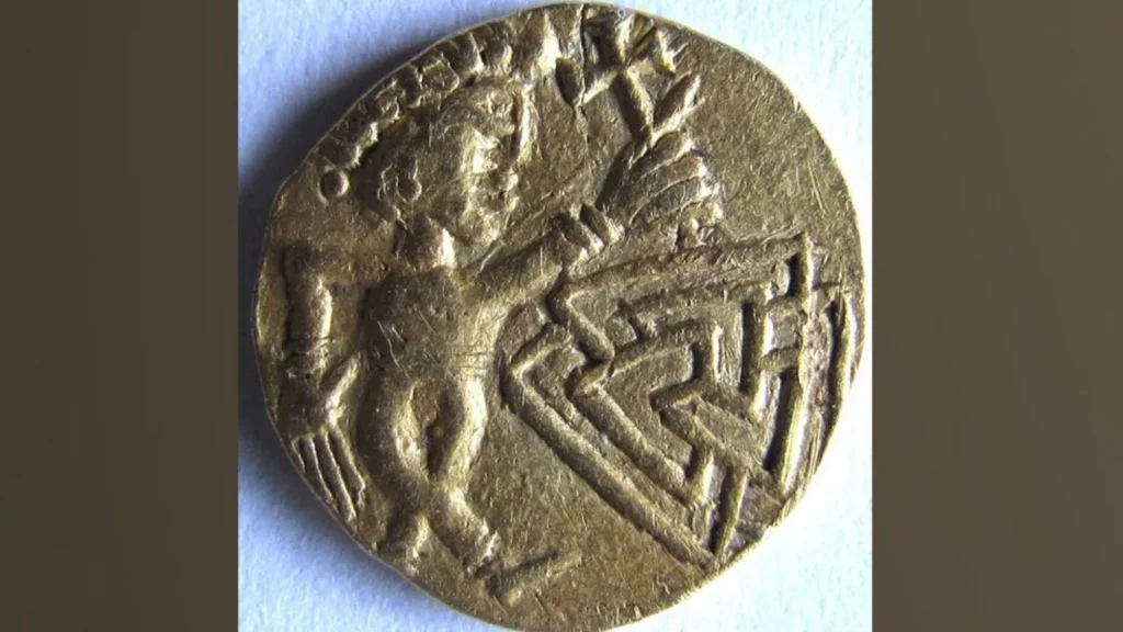 The figure holds his cross above a valknut, a pagan symbol of three interlocked triangles. Similar designs have been found on Anglo-Saxon cremation urns. Credit: Adrian Marsden