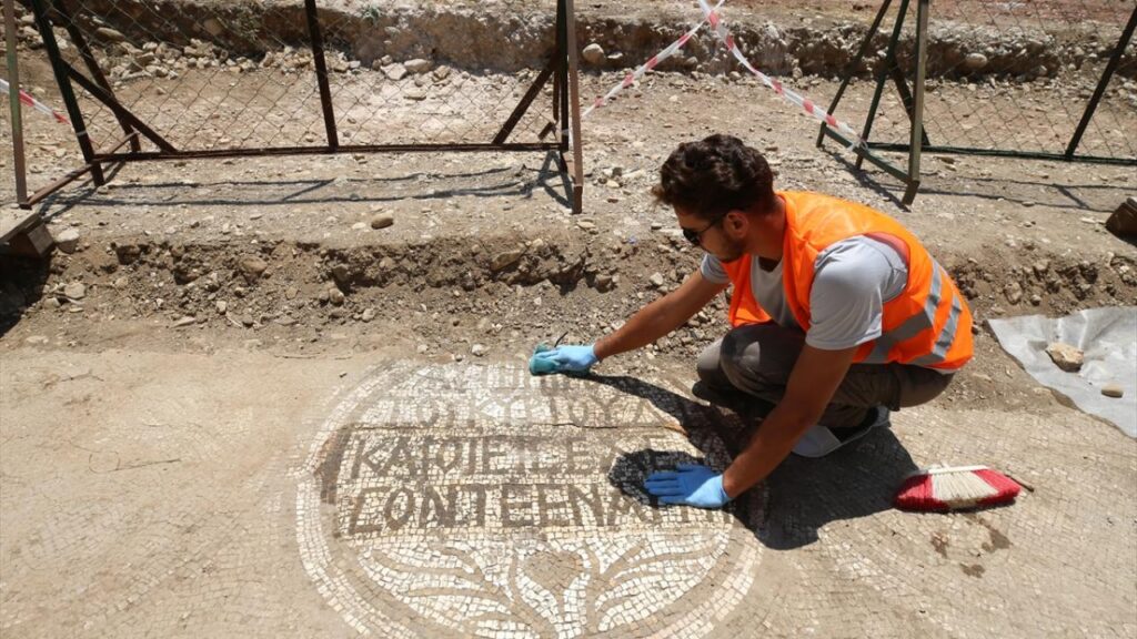 Mosaic inscription at the church entrance in Olympos: “Only those on the righteous path may enter here. Credit: Anadolu Agency (AA)