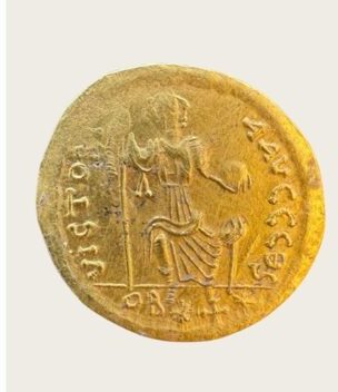 The obverse shows the bust of Emperor Justin facing forward, holding a globe with Victoria. Credit: Sliven Regional Historical Museum