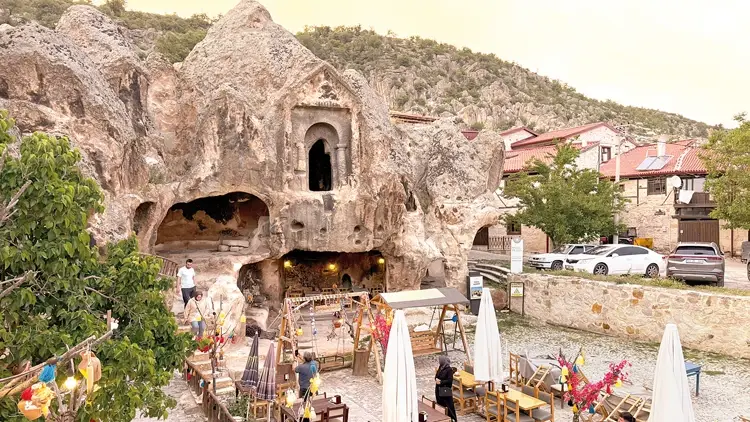 A 3,000-year-old Phrygian tomb in Türkiye illegally turned into a café, sparking cultural outrage. Credit: Selim Uzun - Hürriyet