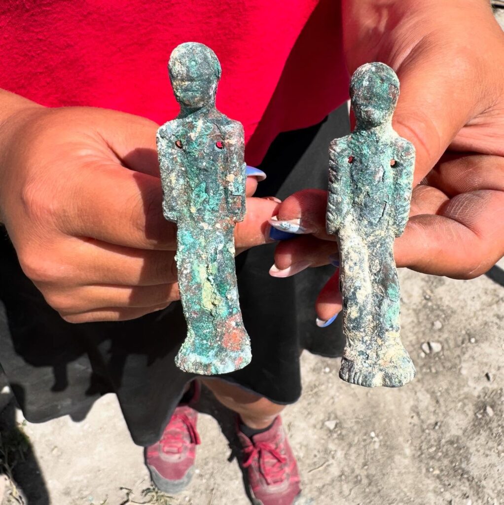 Archaeology student Laura Zentai, participating in ongoing excavations, uncovered three rare bronze figurines estimated to be over 2,000 years old. Credit: Brigetio/Facebook
