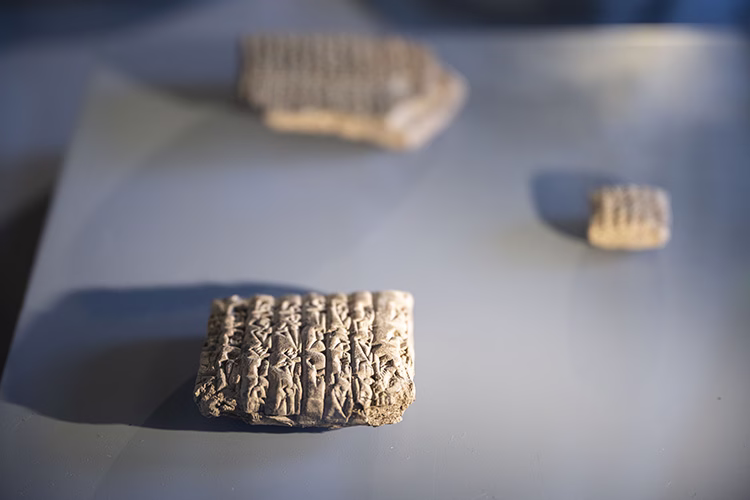 Cuneiform tablet from the Ur III period, part of a collection repatriated from Türkiye to Iraq—etched with early records of temple duties and livestock payments. Credit: AA