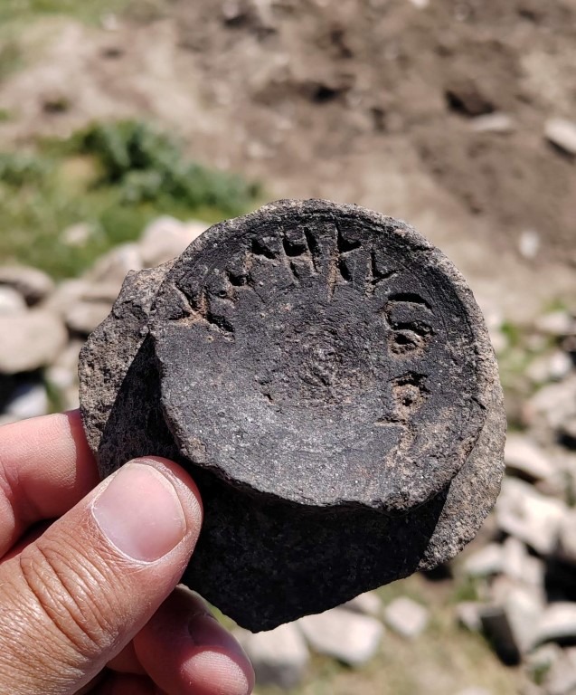 A particularly notable object: a locally made ceramic sherd inscribed with a Greek vulgar graffito ("Ψωλή κύ..."), exemplifying what scholars term aporretic inscriptions. Credit: Courtesy of Dejan Gjorgjievski