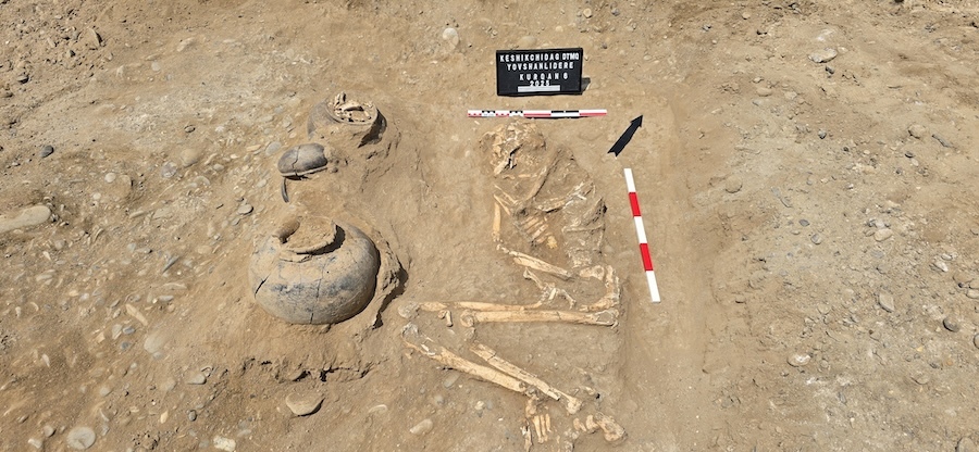 Skeletal remains of the burial with associated artifacts. Credit: Ministry of Culture of the Republic of Azerbaijan