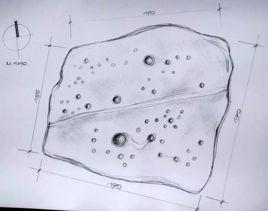 The stone's surface features 56 meticulously carved conical holes of various diameters—24 in the northern half and 32 in the southern—representing stars of different magnitudes. Photos courtesy of Georgi Georgiev.
