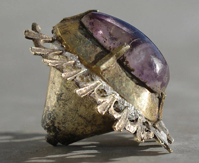 The amethyst may have been part of a bigger setting, such as a brooch or a crown.
