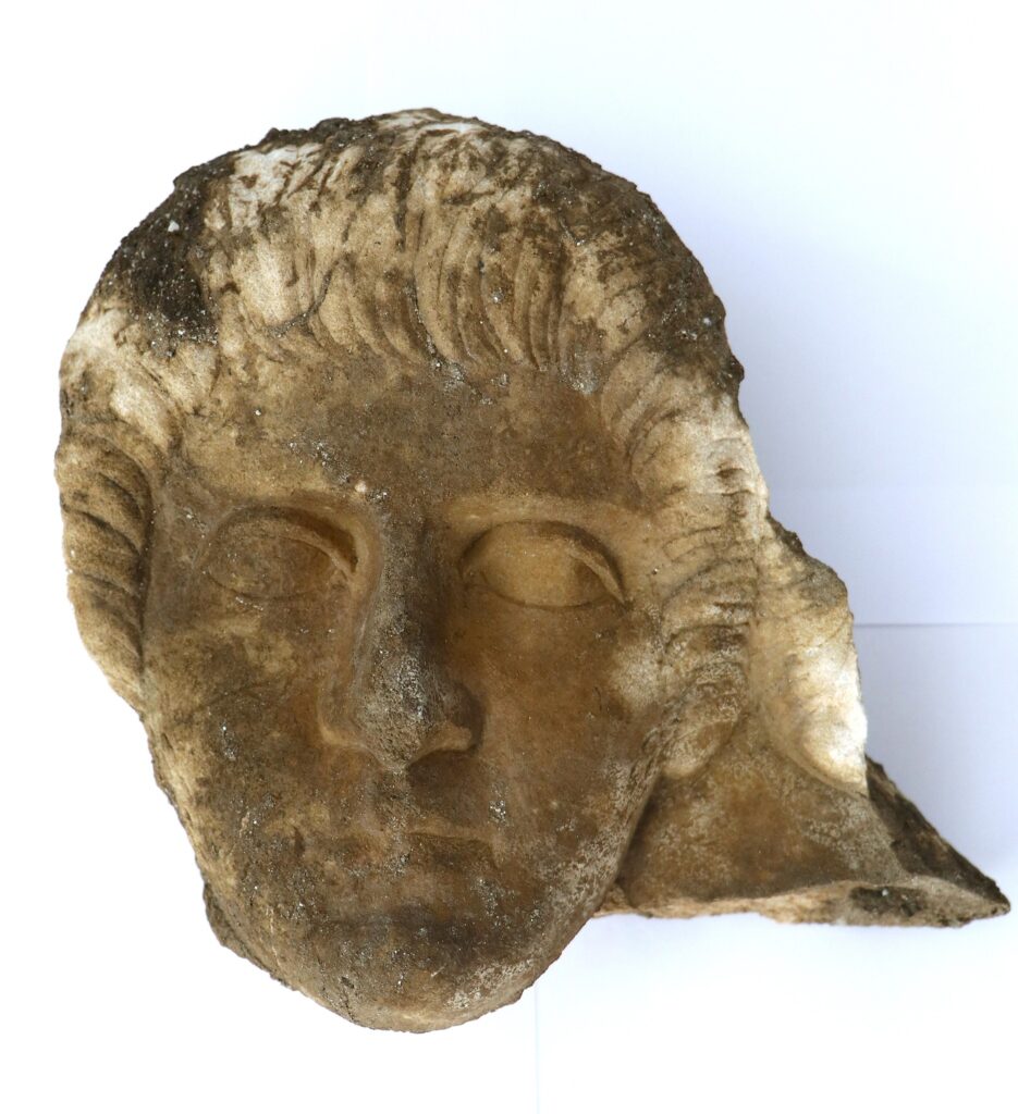 Finely carved marble face of a woman, recently unearthed in the Western Necropolis of Heraclea Sintica. Credit: Archaeologia Bulgarica