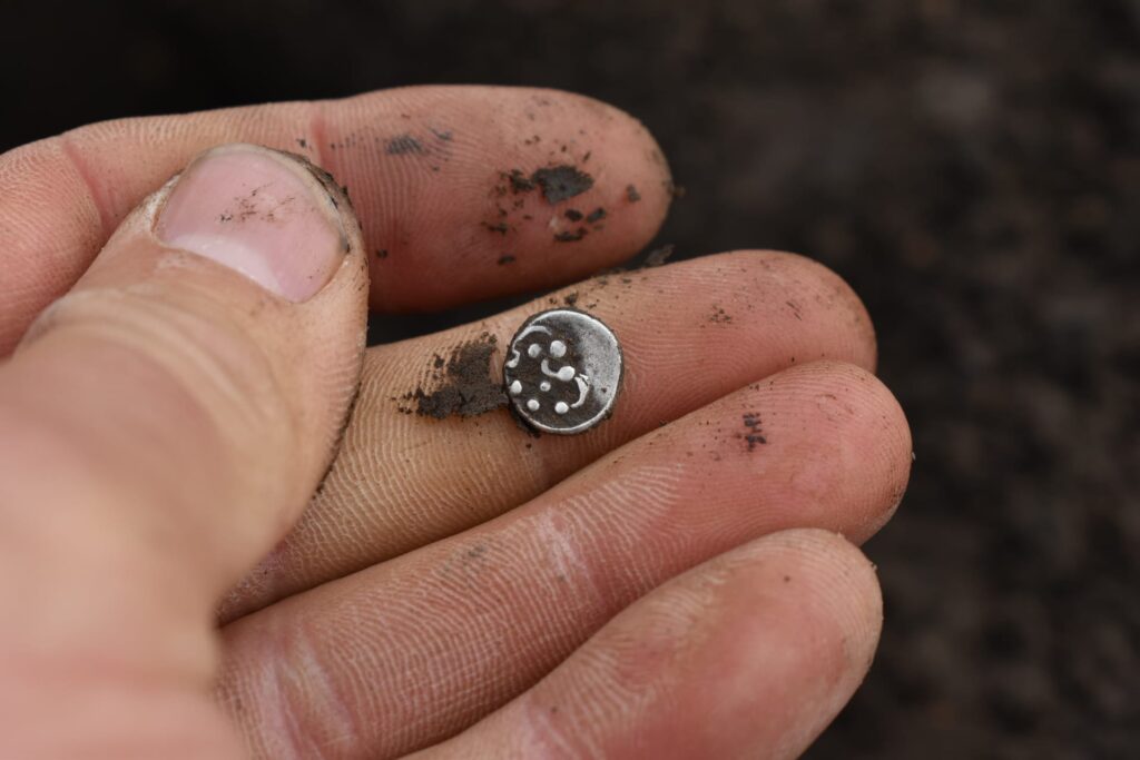 Notable finds include gold and silver coins, some likely minted directly at the site, indicating a sophisticated local economy. Credit: Museum of Eastern Bohemia in Hradec Králové / University of Hradec Králové