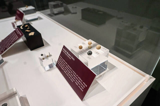 Metal musket balls, excavated from a previously unknown battlefield site in the Ligonier area, are seen on display at the Fort Ligonier Museum. Credit: Shane Dunlap - Triblive