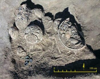 A general view of Grave 12 unearthed at Tepe Chalow and the position of burial goods in the grave. Credit: Vahdati et al. 2025