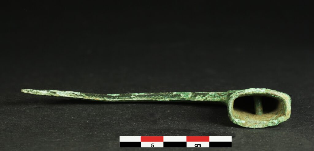 Val-de-Reuil, Le Suret (Eure): British-style socketed sickle from the Late Bronze Age, side view. Credit: S. Le Maho, Inrap