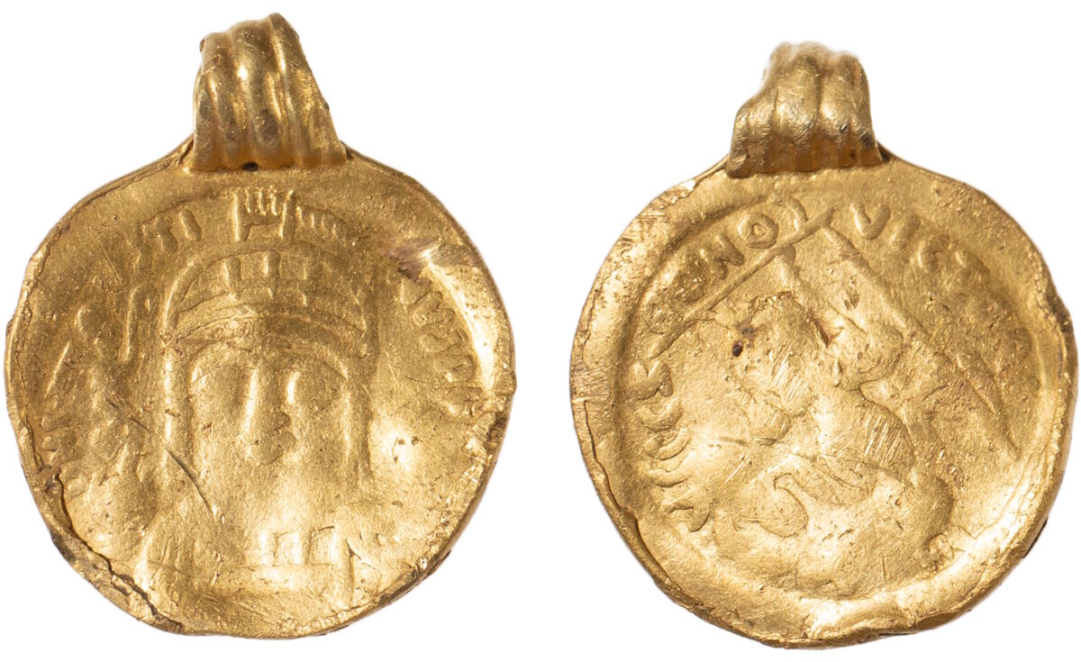 The 19.6mm (0.7in) diameter high quality gold coin pendant is the first evidence of "elite groups of people" in the Thaxted area in the 6th Century. Credit: Colchester and Ipswich Museum Services