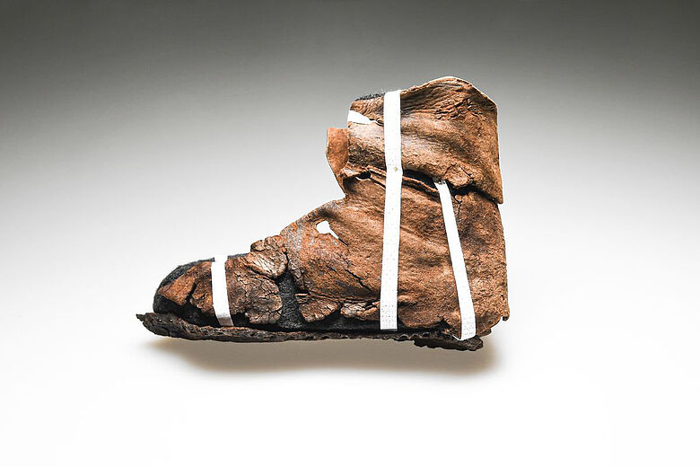Leather shoe/boot (circa 1450), length 12 cm, equivalent to today’s shoe size 19. Credit: Berlin State Office for the Preservation of Monuments (Landesdenkmalamt Berlin), Julia-Marlen Schiefelbein