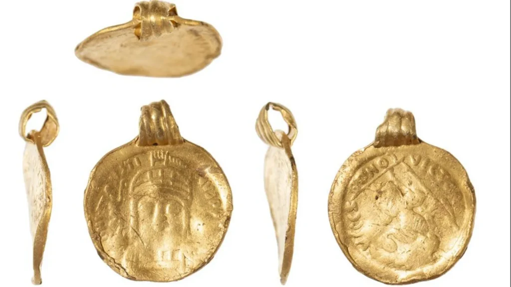 The 19.6mm (0.7in) diameter high quality gold coin pendant is the first evidence of "elite groups of people" in the Thaxted area in the 6th Century. Credit: Colchester and Ipswich Museum Services