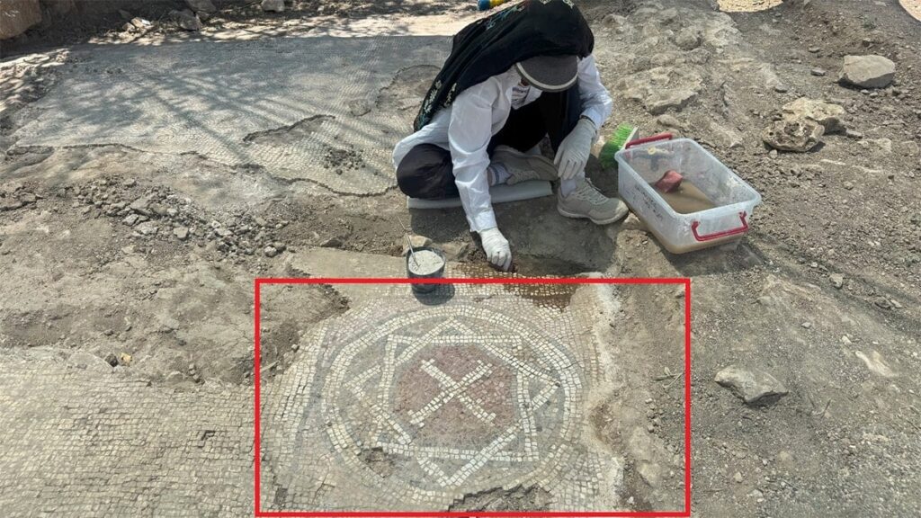 A rare mosaic detail showing a Star of David containing a Christian cross—an unusual blend of religious symbols from the late Roman–early Byzantine era. Credit: DHA