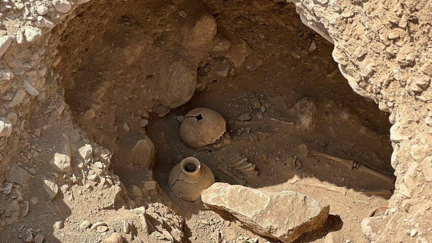 Alongside the skeletal remains, archaeologists have already uncovered numerous artifacts, including pottery. Credit: Batken State University