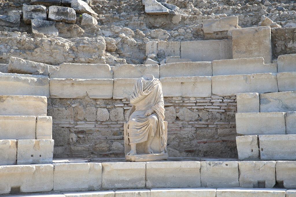 Seated statue believed to represent a chief judge or high-ranking official, discovered within the ancient assembly building of Laodicea. Credit: Sebahatdin Zeyrek - AA