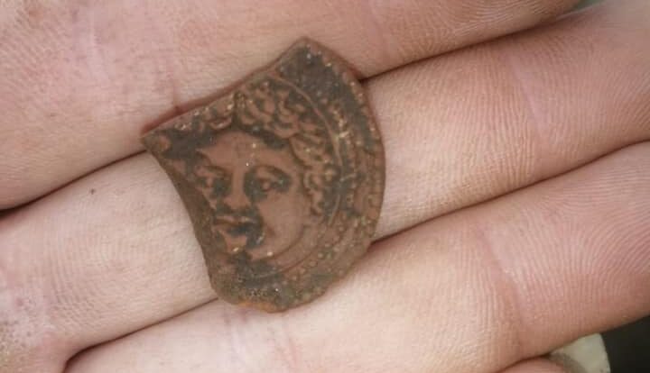 In 2020, a terracotta medallion depicting Gorgon Medusa was discovered at Moon Glade in Arkhyz. Credit: Russian Archaeological News - PRC