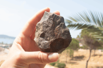 A Paleolithic handaxe with a broken distal end, discovered during the Ayvalık survey. Credit: Journal of Island and Coastal Archaeology,