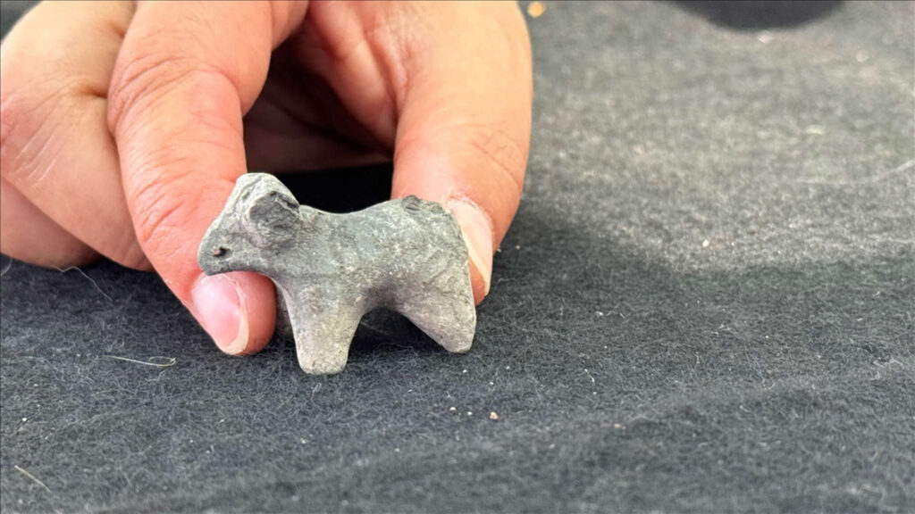 A miniature bull, believed to be a toy, was discovered during the excavation. Credit: Abdullah Doğan – Anadolu Agency