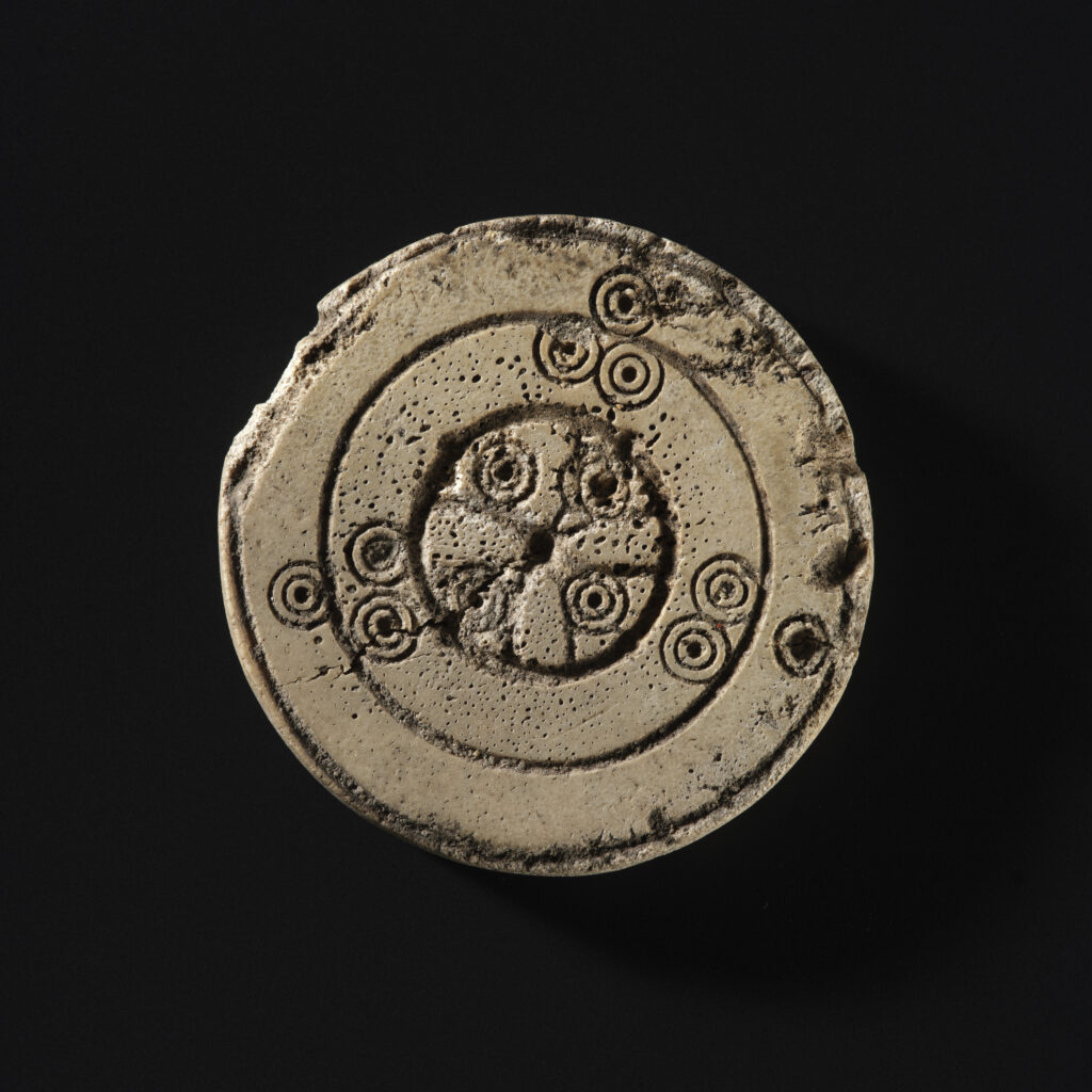 Gaming pieces. Credit: National Museums Scotland