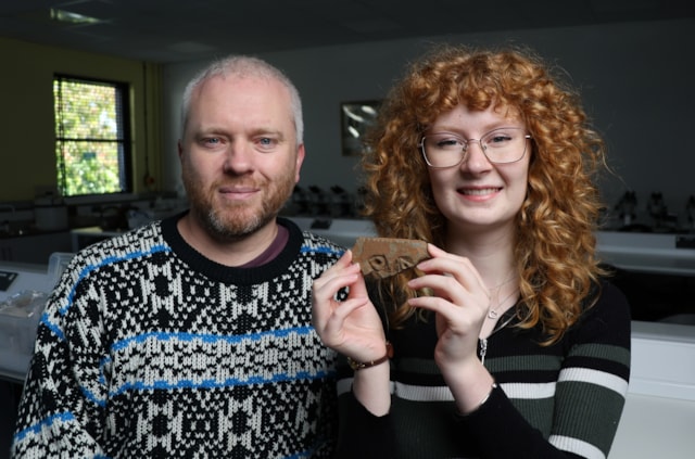 Professor Gordon Noble (left) with student Jodie Allan who dug up the face. Credit: University of Aberdeen