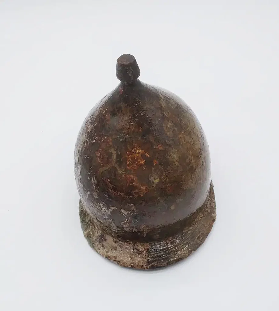Montefortino helmets were used by Roman forces from roughly the 4th century BC through the 1st century AD, making this specimen not just rare, but also contextually significant.