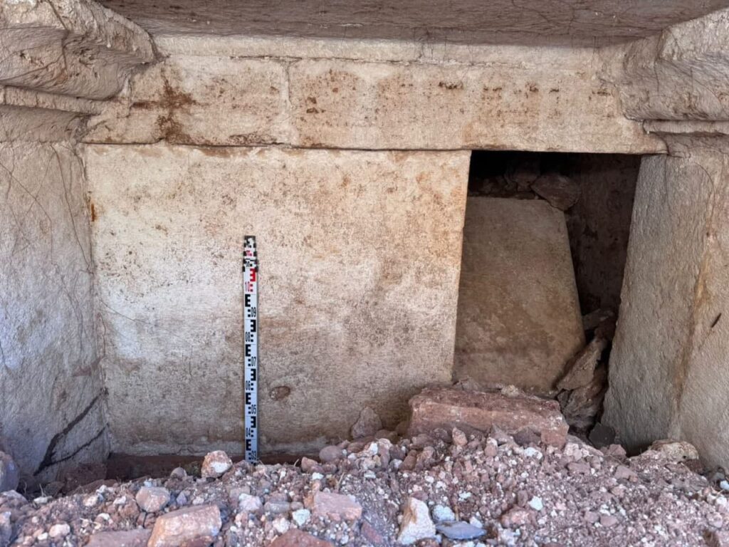 The tomb is a monumental structure measuring approximately 9 by 6 meters, featuring a 2.4-meter-high burial chamber and rare architectural and epigraphic elements. Credit: Minister Blendi Gonxhja,