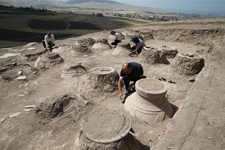 Archaeologists concentrated their work on the southern section of the castle ruins, where they uncovered 76 symmetrically arranged pithoi marked with cuneiform inscriptions, believed to have served as storage for grain and beverages during the Urartian period. Credit: AA