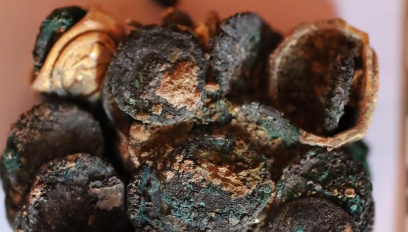 Archaeologists have uncovered a remarkable Roman treasure, comprising over 40 coins and exquisite jewelry made of precious metals. Credit: Muzeul Național de Istorie a României