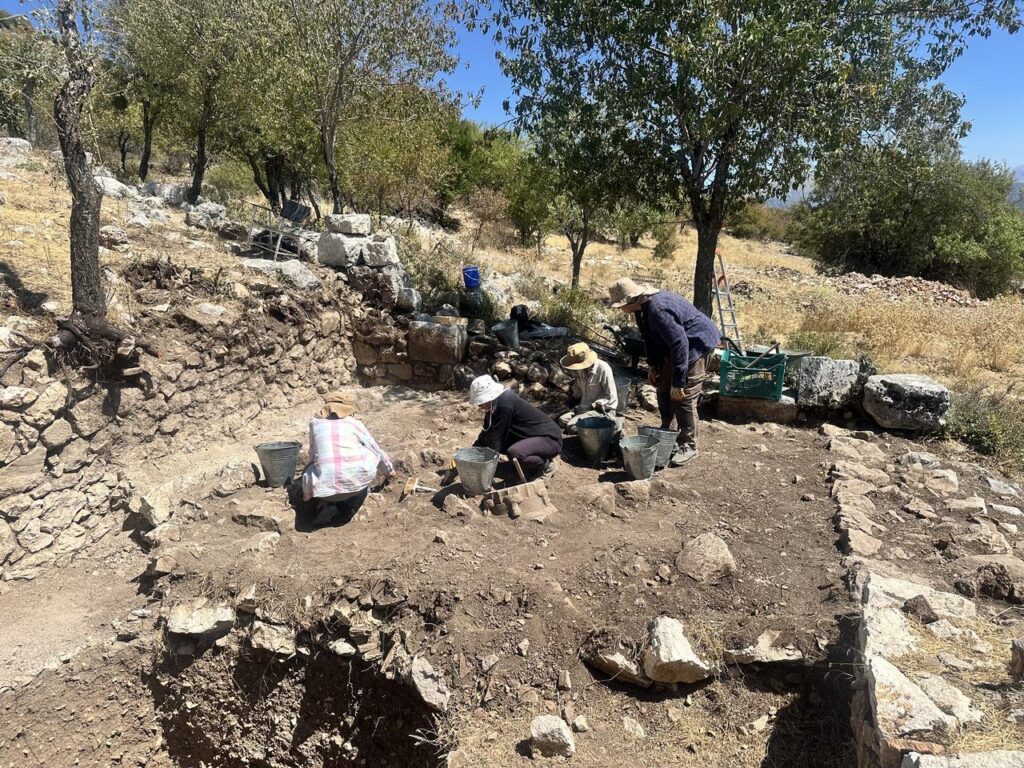 Archaeologists unearthed structures believed to have served as a storeroom and soup kitchen in the 2,200-year-old ancient city of Timbriada, located in Isparta’s Aksu district. Credit: AA