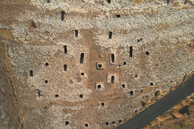 Archaeologists have revealed 83 rock-cut tombs, spanning periods from the Early Bronze Age to Roman times. Credit: AA