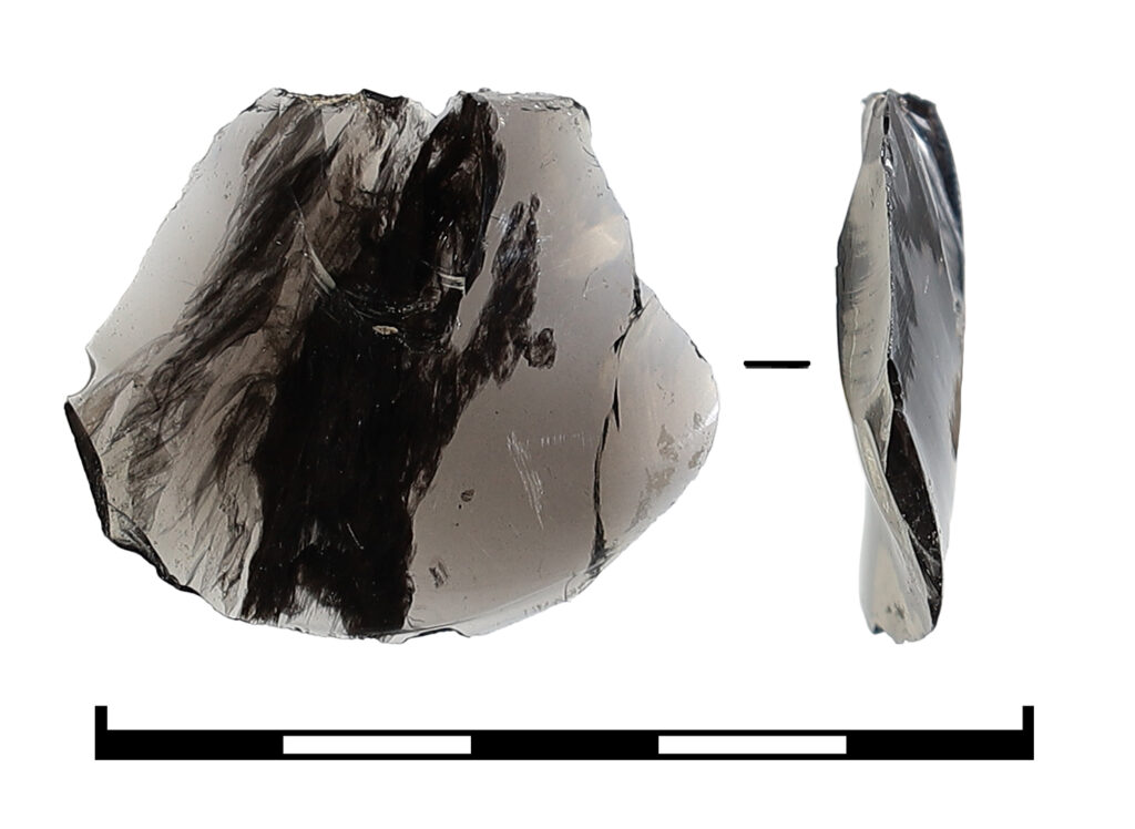 Obsidian flake. Credit: Timur Gatsaev - Institute of Archaeology of the Russian Academy of Sciences