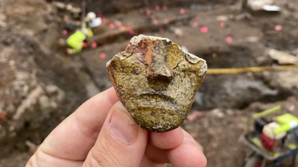 Sherd of a 13th-14th century jug with face. Credit: Guard Archaeology