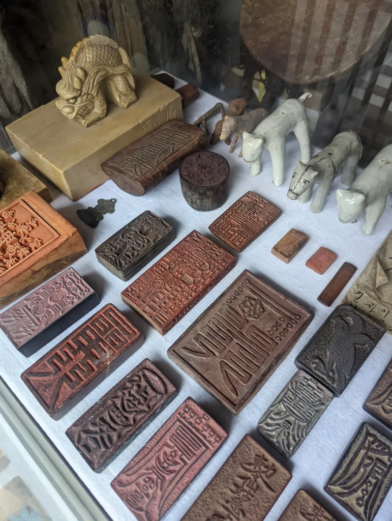 While many imagine bujeok as hand-drawn works of mystical calligraphy, archaeology reveals a more nuanced past. At the Museum of Korean Shamanism in Seoul, a collection of centuries-old wooden stamp blocks tells another story.  Credit: Museum of Korean Shamanism - Seoul, Korea