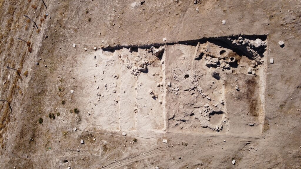 Archaeologists uncovered the remains of a burned house and adjacent fortress walls dating to the Hellenistic period during this year’s excavations. Credit: AA