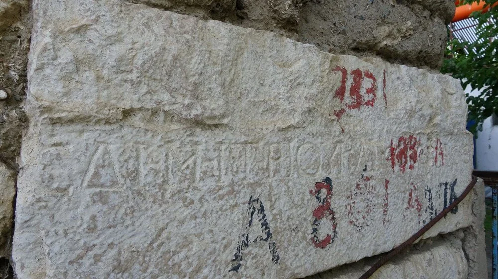 The ten inscribed stones used in the house’s foundation were officially documented and placed under supervision by the Burdur Museum Directorate. Credit: İHA