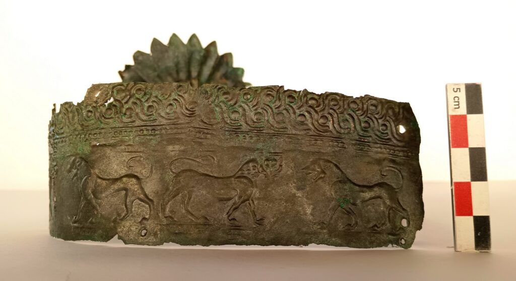 Bronze diadem band adorned with repoussé pairs of heraldic lions—male and female—symbols of sovereign authority across the ancient Mediterranean. Credit: Greek Ministry of Culture