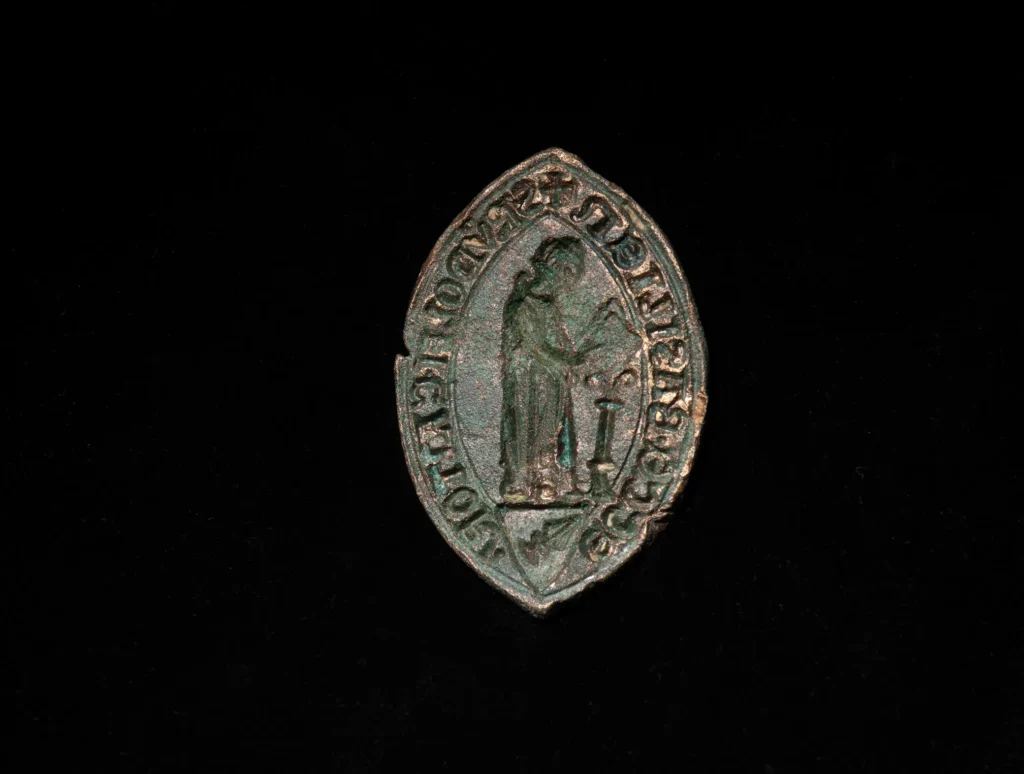 Rare, well-preserved medieval seal of Basel Cathedral cantor Rudolf Kraft discovered in the Rhine. Credit: Philippe Saurbeck, Archäologische Bodenforschung Basel