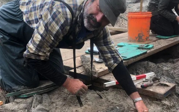 The waka was discovered by father and son Vincent and Nikau Dix, and Dr Justin Maxwell of Sunrise Archaeology has led the analysis. Credit: Sunrise Archaeology