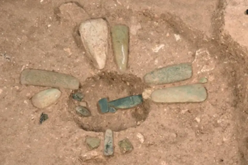 The team excavated jade axes and ornaments that were likely left later, in return trips to the site, after builders made offerings to the cruciform cache and filled it in. Credit: Takeshi Inomata/School of Anthropology
