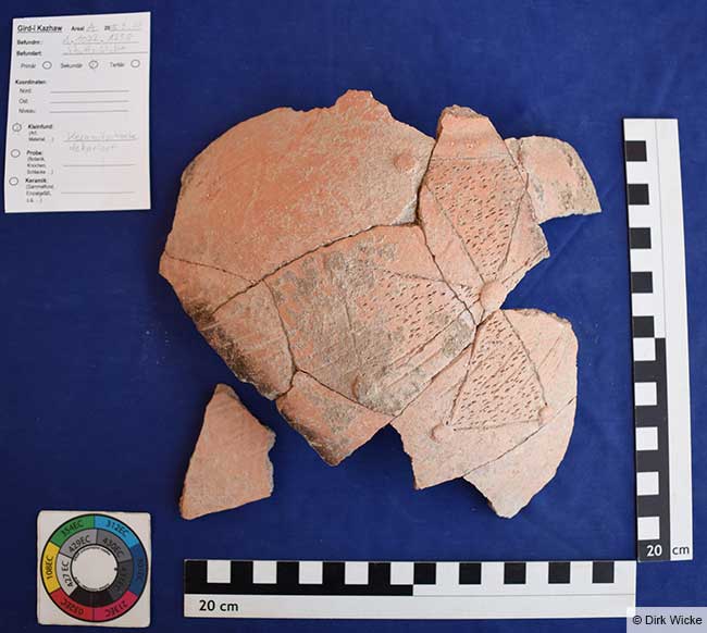 The main evidence for the building’s use as a Christian gathering place, besides its architecture, is the discovery of a pottery sherd decorated with a Maltese cross. Credit: Dirk Wicke
