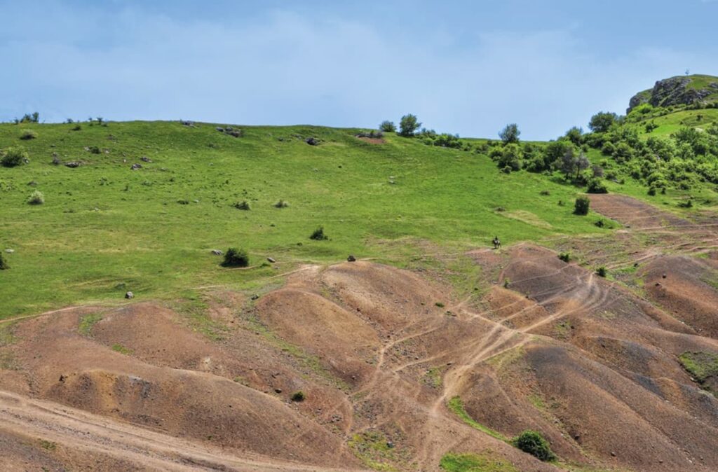 Mining debris scattered across the slopes of Šaškovac (Shashkoc) near Janjevo, Kosovo, marking the long-term impact of ancient extraction activities in one of the Central Balkans’ historic mining districts. Credit: Dragana Mladenović, 2025
