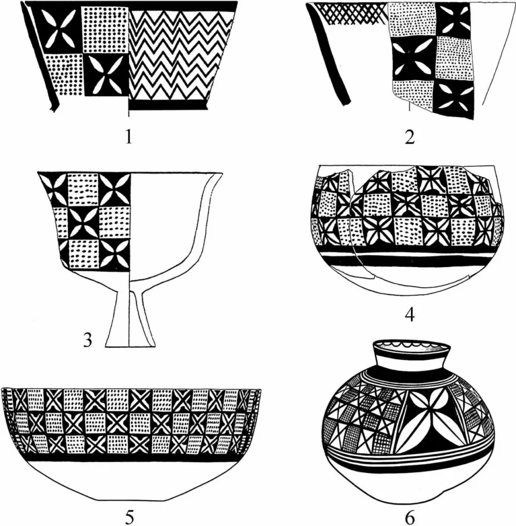 Small four-petaled flowers set within black squares arranged in a checkerboard pattern on Halafian painted pottery. Credit: Yosef Garfinkel