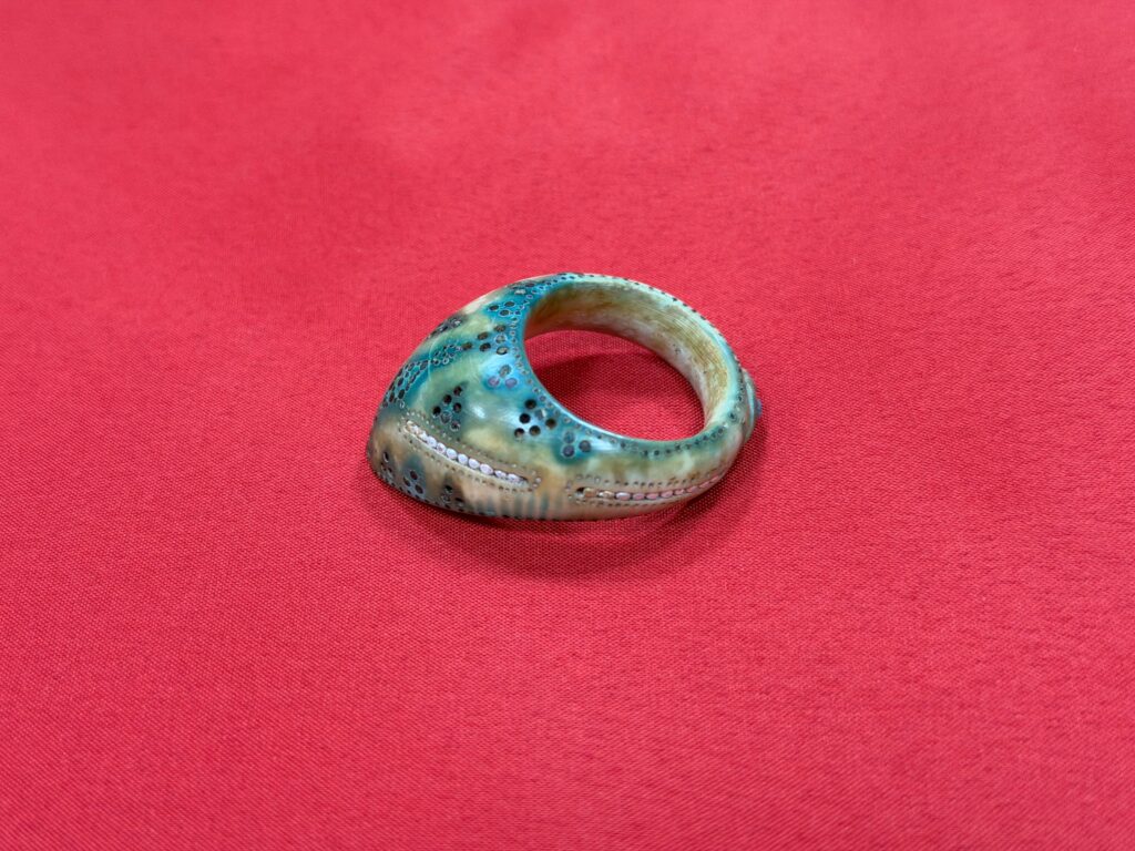 Small pearls are set in neat rows on both sides of the ring’s shield, while a turquoise stone is embedded into a diamond-shaped platform on the outer surface. Credit: General Directorate of Cultural Assets and Museums 