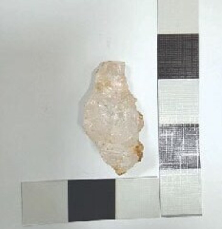 The quartz artefact shown in the image, discovered alongside the dancing female figurine, was carefully shaped and placed in a defined stratigraphic layer, suggesting it may have served a symbolic or ritual purpose, according to excavation team member Anam Aziz. Credit: Dawn