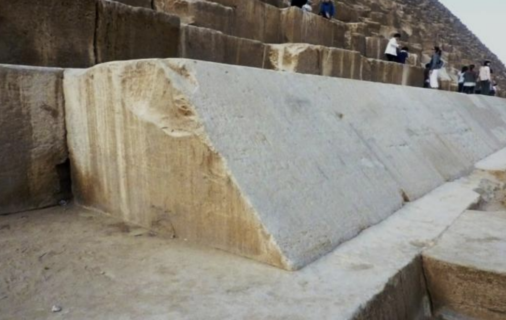 Base of Akhet Khufu with the few remaining limestone blocks of the cladding. Credit: Donini, A. (2026)